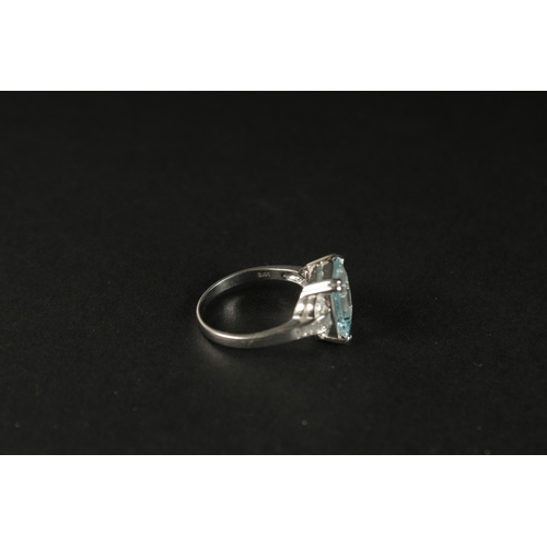 1033 - AN 18CT WHITE GOLD AQUAMARINE AND DIAMOND RING. Emerald cut aquamarine 3.41ct. RBC and baguette diam... 