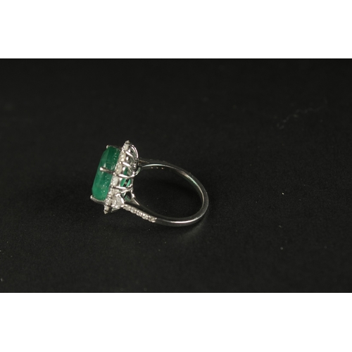 1037 - AN 18CT WHITE GOLD LARGE OVAL EMERALD AND RBC DIAMOND RING, with trapezoid and RBC diamond shoulders... 