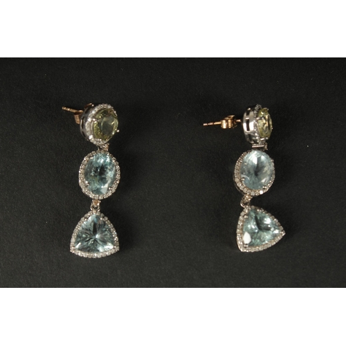 1043 - AN EXQUISITE MATCHING EARRINGS AND NECKLACE IN WHITE METAL set with aquamarines, morganite, heliodor... 