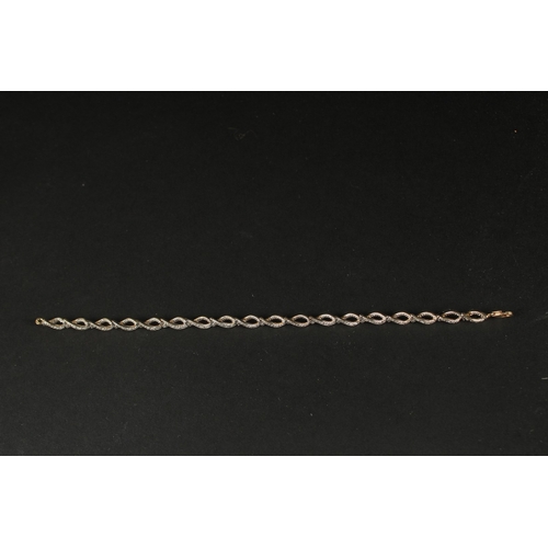 1049 - A GOLD-PLATED SILVER TWIST STYLE BRACELET set with diamonds (0.50ct approx.), boxed.