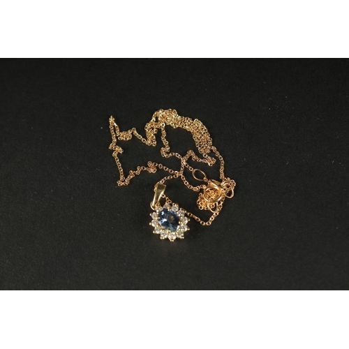 1052 - AN 18CT YELLOW GOLD OVAL SAPPHIRE AND RBC DIAMOND CLUSTER NECKLACE, boxed. Sapphire 0.75ct. Diamonds... 