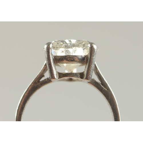 1054 - A SUPERB PEAR-SHAPED DIAMOND RING. APPROX. 5CTS, SET IN PLATINUM.