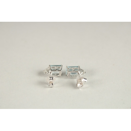 1070 - A PAIR OF 18CT WHITE GOLD, DIAMOND AND AQUAMARINE EAR STUDS.