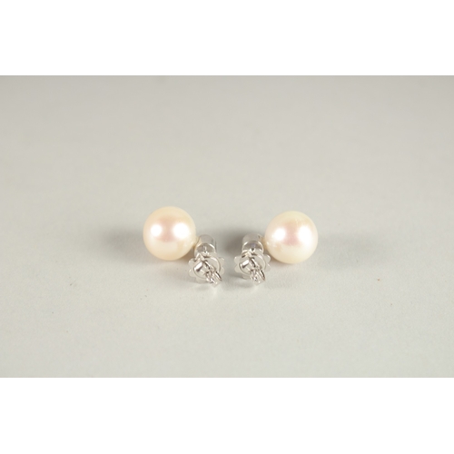 1071 - A PAIR OF 18CT WHITE GOLD, DIAMOND AND PEARL EAR STUDS.