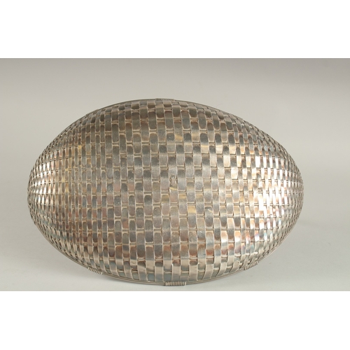 1133 - A WMF SILVER PLATED BASKET WEAVE FORM BASKET with strap handle. 33cms long.