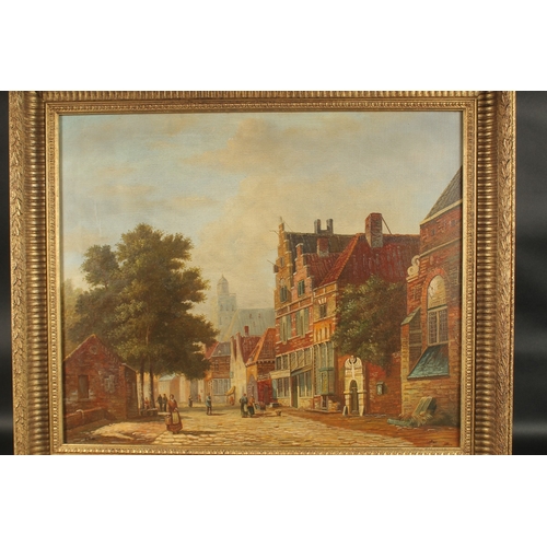 1219 - L. ROTH. A large Dutch street scene with buildings, trees and figures. Signed. Oil on canvas. 24