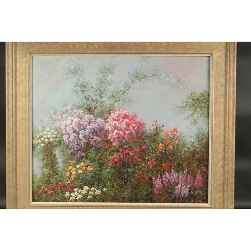 1230 - G. CARBTE. Still life of flowers. Signed. Oil on board. 20