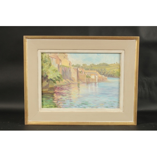 1254 - GLADYS DENHAM JONES. River scene, buildings to the waters edge. Oil on board. 9.5