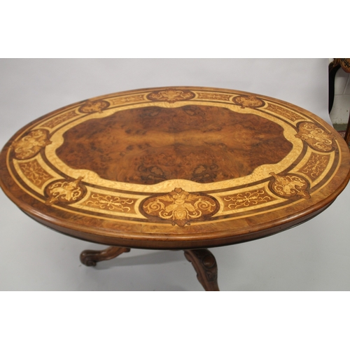 509 - A GOOD VICTORIAN INLAID OVAL LOO TABLE, good inlaid top, centre turned pillar ending in tripod curvi... 