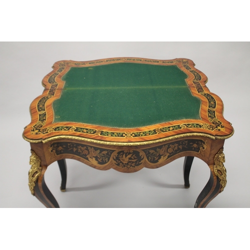 510 - A VERY GOOD VICTORIAN KINGWOOD INLAID FOLDING TOP CARD TABLE, the top inlaid with musical trophies, ... 