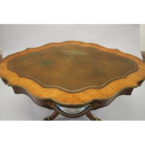 512 - A GOOD 19TH CENTURY KINGWOOD LEATHER TOP OVAL TABLE, the sides with Sevres porcelain panels, ormolu ... 