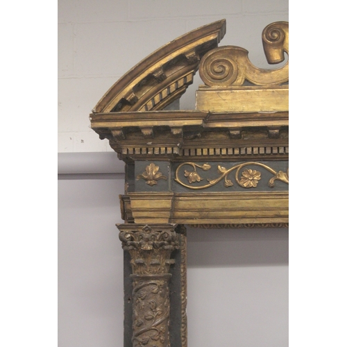 513 - A LARGE LATE 17TH CENTURY - EARLY 18TH CENTURY CARVED WOOD DOOR FRAME with a large pair of carved co... 