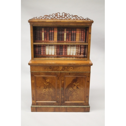 520 - A 19TH CENTURY WALNUT STANDING BOOKCASE, the top with pierced fretwork, single shelf and faux books,... 