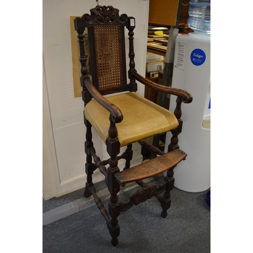 529 - AN 18TH CENTURY STYLE CHILD'S OAK HIGHCHAIR.