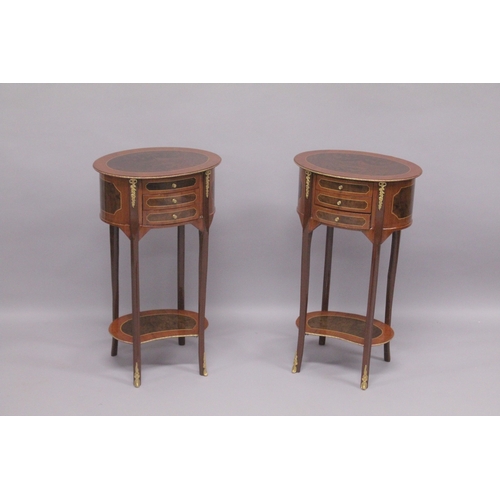 530 - A PAIR OF LOUIS XVITH STYLE INLAID OVAL BEDSIDE CUPBOARDS with three drawers and an under-tier. 28in... 