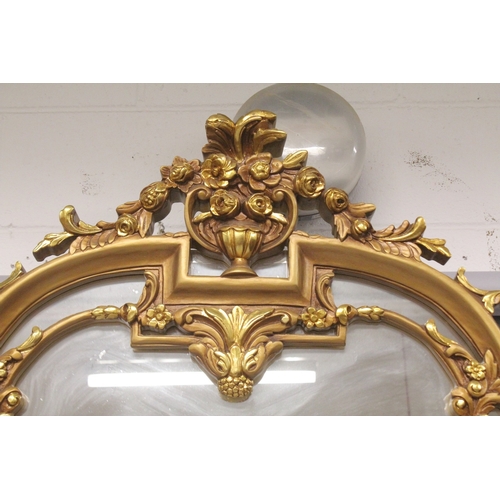 541 - A GOOD LOUIS XVITH STYLE GILTWOOD CONSOLE AND MIRROR with marble top with urns, flowers and column s... 