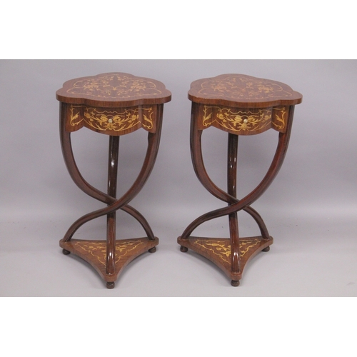 544 - A PAIR OF INLAID SHAPED TOP TABLES with unity stretcher and under-tier. 28ins high x 17ins wide.