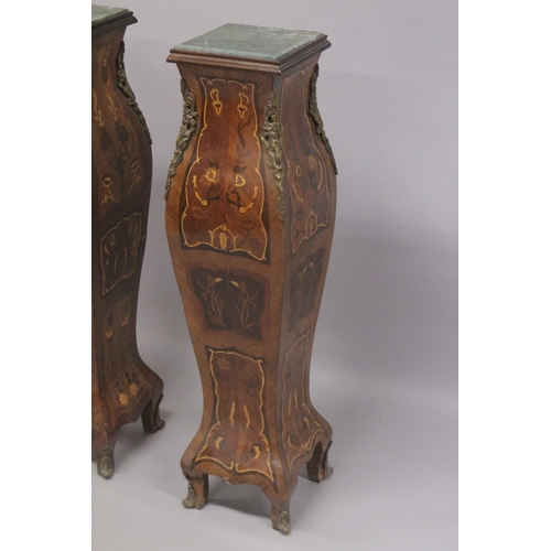 546 - A PAIR OF INLAID PEDESTALS with square marble tops. 44ins high.