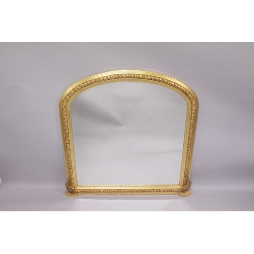 548 - A GILTWOOD OVERMANTLE MIRROR. 48ins high x 46ins wide.