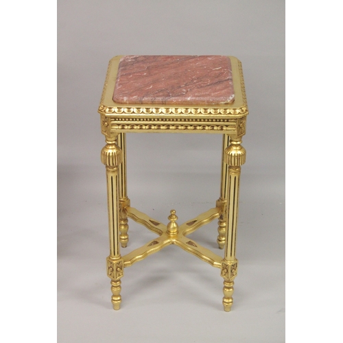 552 - TWO MARBLE TOP SQUARE GILTWOOD TABLES, on fluted legs with under-tier. 28ins high x 15ins square.... 