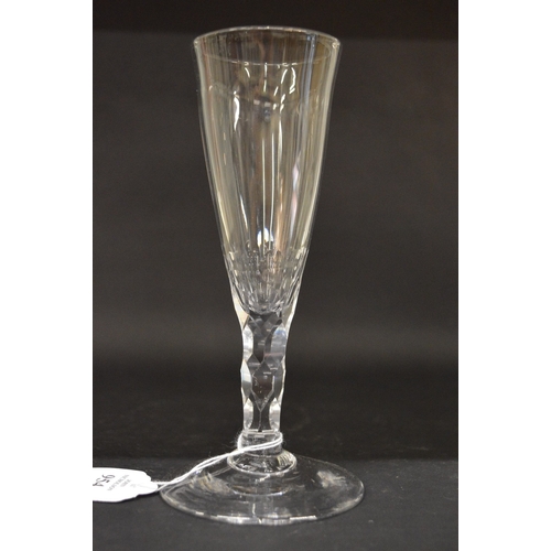 578 - A GEORGIAN WINE GLASS with plain bowl and facet cut stem.