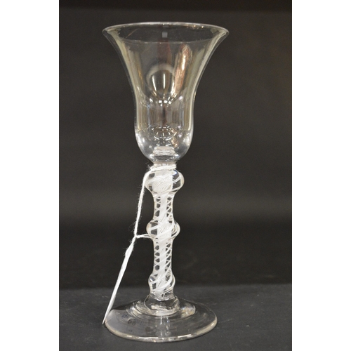 579 - A GOOD GEORGIAN WINE GLASS with tapering inverted bowl and double knop air twist stem.