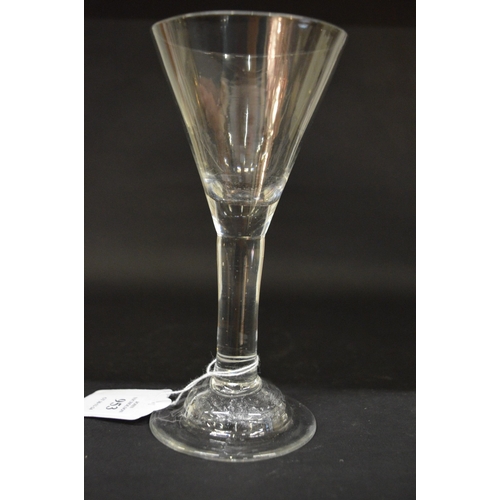 580 - A GEORGIAN WINE GLASS with tapering bowl and plain stem.