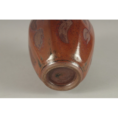 598 - A STUDIO POTTERY TAPERING HEXAGONAL SHAPE VASE, in the manner of Bernard Leach. 15cms high.