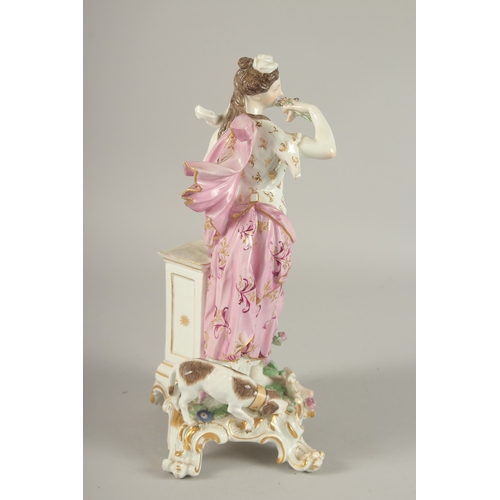 599 - A GOOD 19TH CENTURY MEISSEN PORCELAIN CLASSICAL FEMALE FIGURE standing beside a pillar with a small ... 