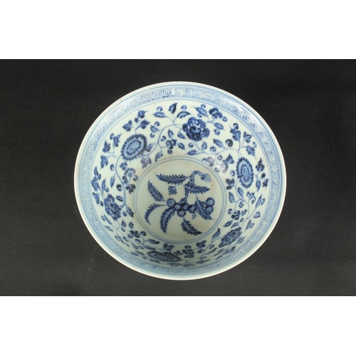 612 - A CHINESE BLUE AND WHITE FLORAL BOWL. 20.5cms diameter.