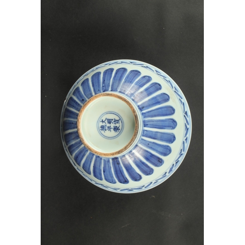 612 - A CHINESE BLUE AND WHITE FLORAL BOWL. 20.5cms diameter.