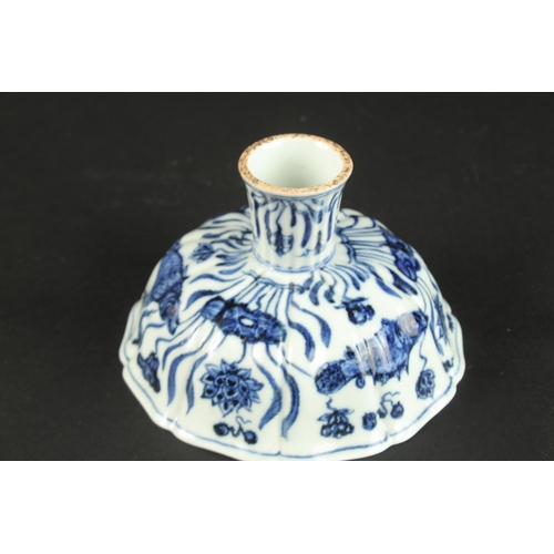 613 - A CHINESE BLUE AND WHITE PETAL SHAPE STEM CUP. 15.5cms wide.