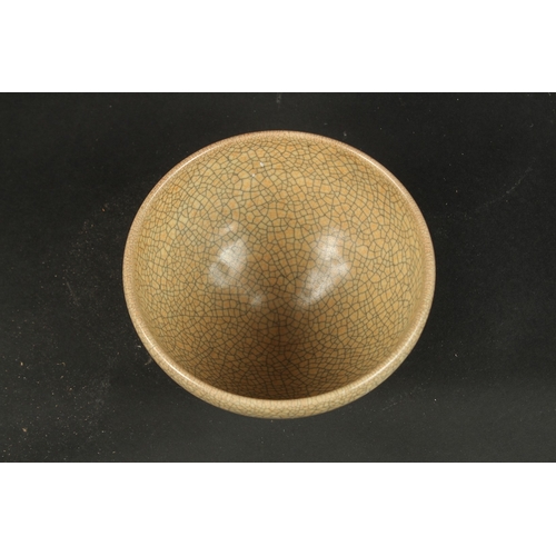 618 - A CHINESE CRACKLE GLAZE PORCELAIN BOWL. 15.5cms diameter.