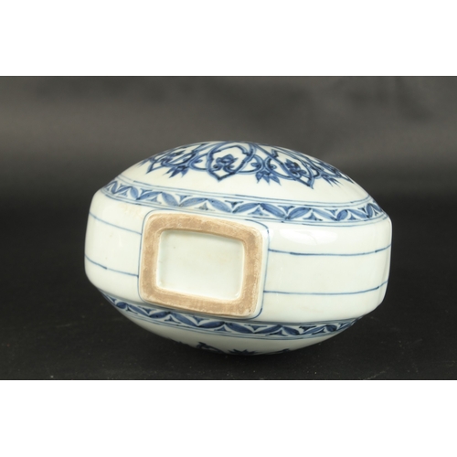 623 - A CHINESE BLUE AND WHITE PORCELAIN MOON FLASK. 31cms high.