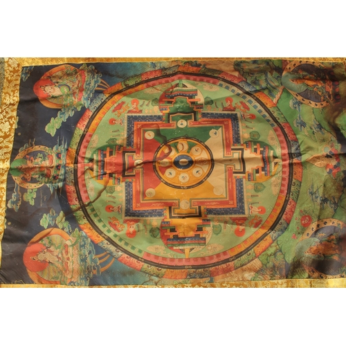 626 - A TIBETAN THANGKA on silk.