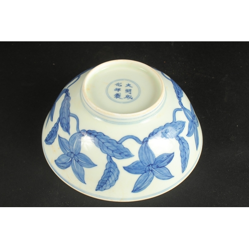 628 - A CHINESE BLUE AND WHITE FLORAL BOWL. 19cms diameter.