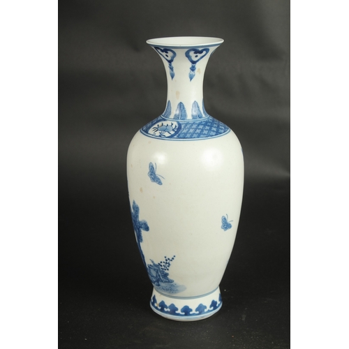 629 - A CHINESE BLUE AND WHITE VASE decorated with figures. 30cms high.