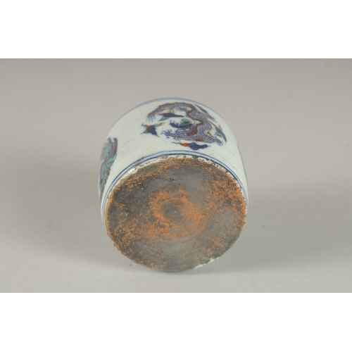 643 - A CHINESE BLUE AND WHITE WATER DROPPER. 2.75cms.