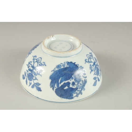 646 - A CHINESE BLUE AND WHITE CIRCULAR RICE BOWL. 6ins diameter.