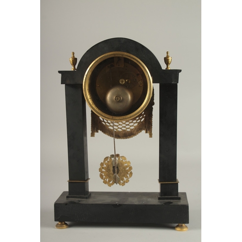 655 - A GOOD EARLY 19TH CENTURY BLACK MARBLE AND ORMOLU CLOCK with circular enamel dial, signed Frenier Ju... 