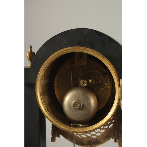 655 - A GOOD EARLY 19TH CENTURY BLACK MARBLE AND ORMOLU CLOCK with circular enamel dial, signed Frenier Ju... 