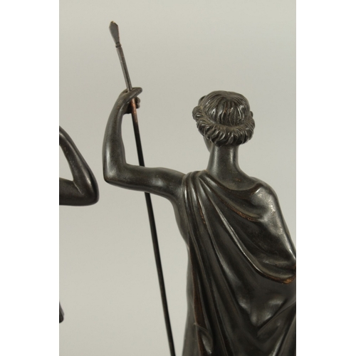 665 - GRAND TOUR BRONZES. A VERY GOOD PAIR OF CLASSICAL BRONZE FIGURES of a man carrying a staff and a you... 