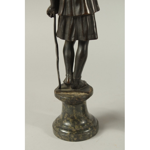 665 - GRAND TOUR BRONZES. A VERY GOOD PAIR OF CLASSICAL BRONZE FIGURES of a man carrying a staff and a you... 