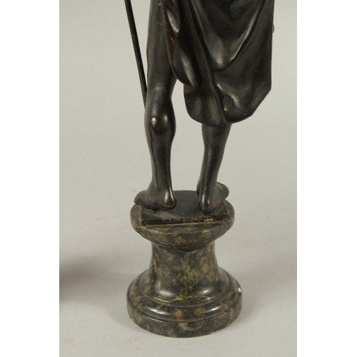 665 - GRAND TOUR BRONZES. A VERY GOOD PAIR OF CLASSICAL BRONZE FIGURES of a man carrying a staff and a you... 