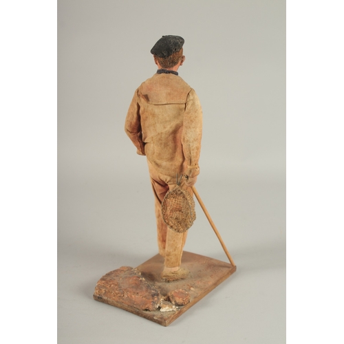 678 - AN UNUSUAL MAQUETTE OF A STANDING FRENCHMAN by J. LE BROEC, made from fibre, wood and painted. 32cms... 