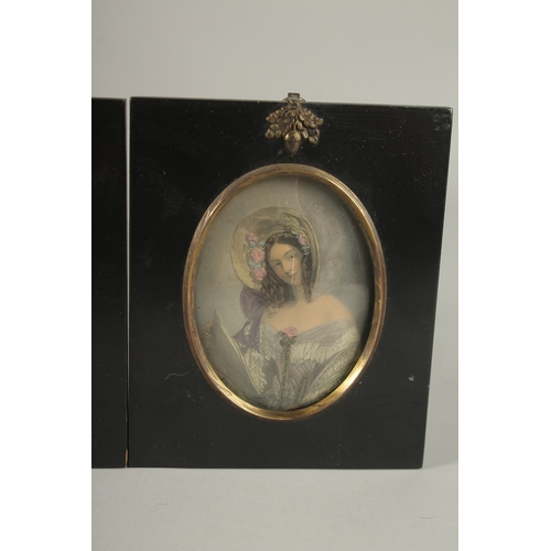 683 - A SET OF FOUR LATE VICTORIAN PORTRAIT MINIATURES OF LADIES. Each: 15cms x 12.5cms.