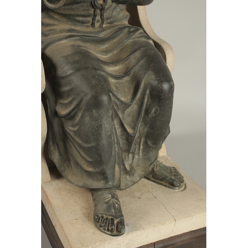 685 - A LARGE BRONZE CLASSICAL SEATED FIGURE, mounted on a stone effect throne, the figure with right hand... 