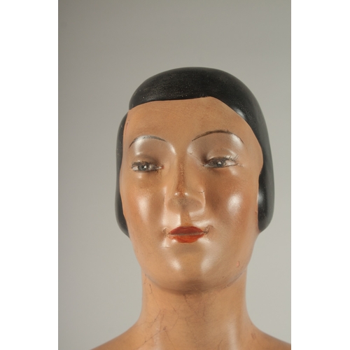 722 - A FRENCH ART DECO HAT SHOP MANNEQUIN. No. 58, on a square base. 2ft 3ins high.