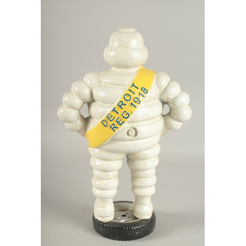 763 - A LARGE CAST IRON MICHELIN MAN. 15ins high.