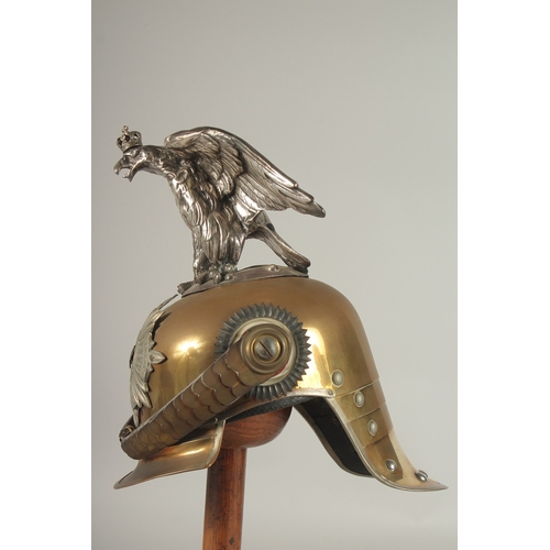 797 - A LARGE PRUSSIAN BRASS AND LEATHER GARDE DE CORPS HELMET, with a large eagle badge MIT. GOTT. FUR. K... 